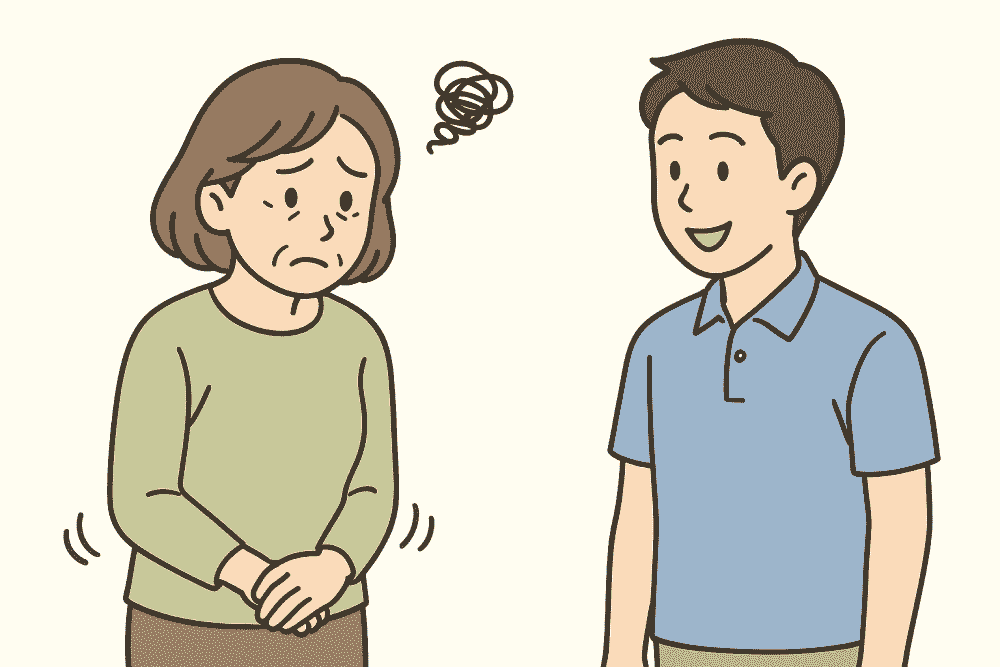 年下スタッフに質問することに遠慮し、ためらう50代女性のイラスト。