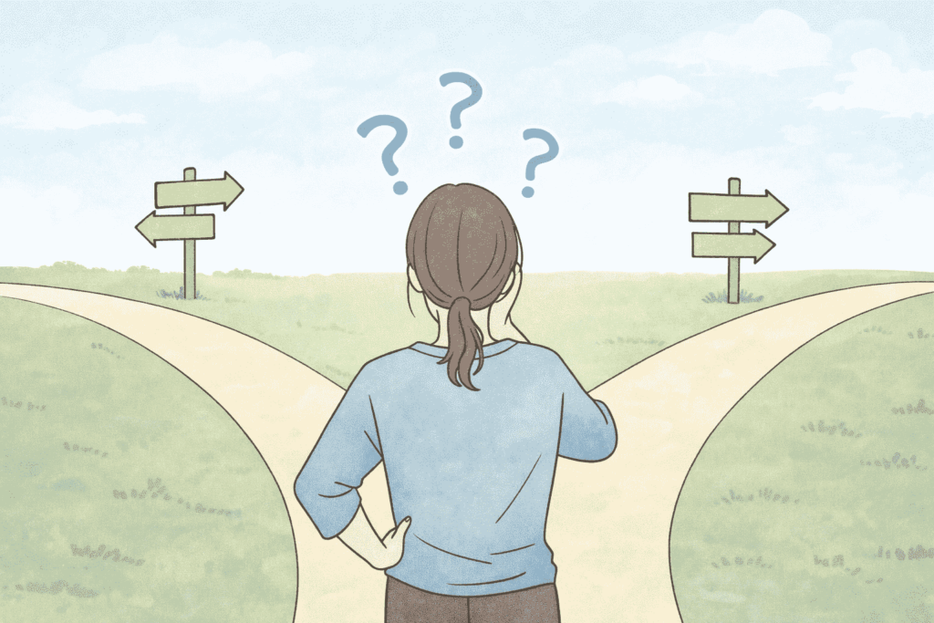 分かれ道の前で立ち止まり、どの方向に進むべきか迷っている人物のイラスト。選択肢が多く、判断できずに動けなくなっている状態を表している。